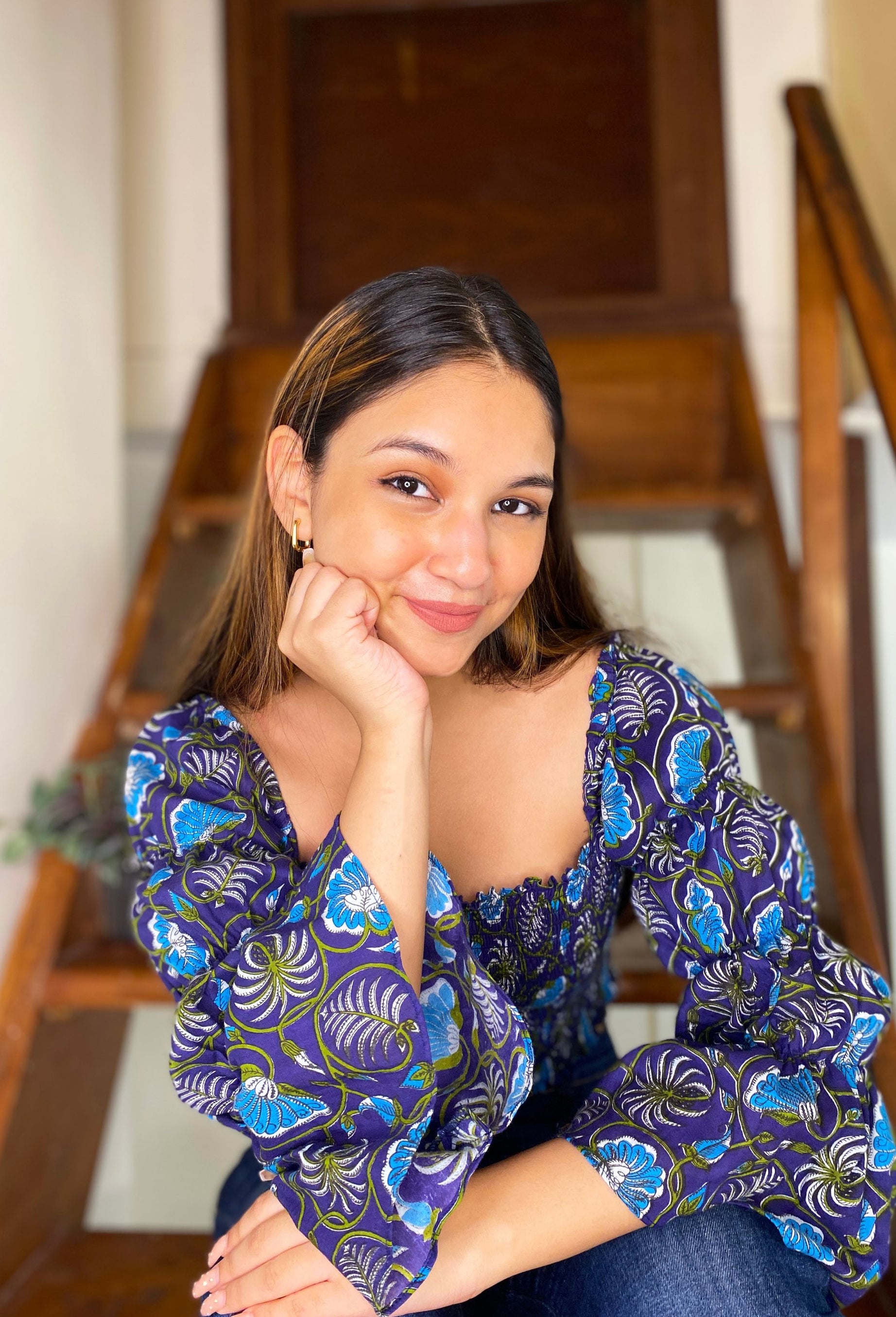 Smocked top from in a Blue Floral Print Crafted from Cotton