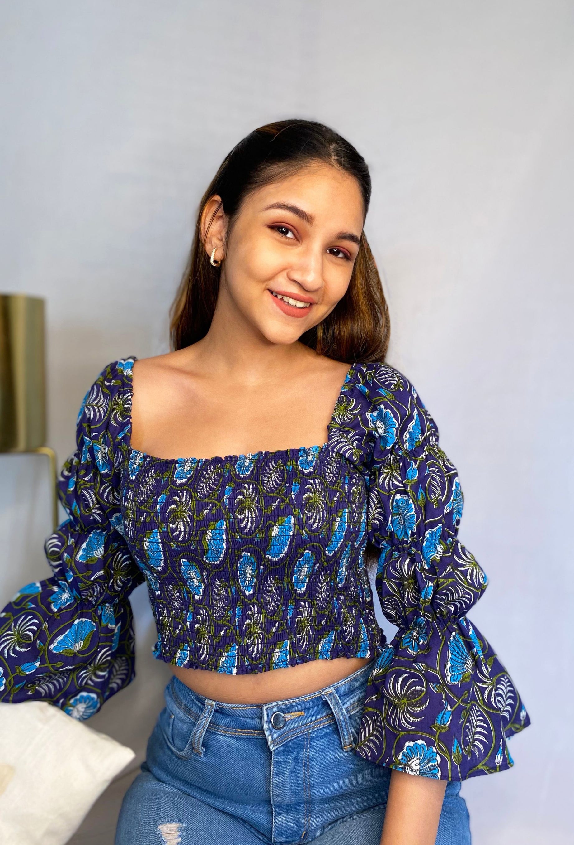 Smocked top from in a Blue Floral Print Crafted from Cotton