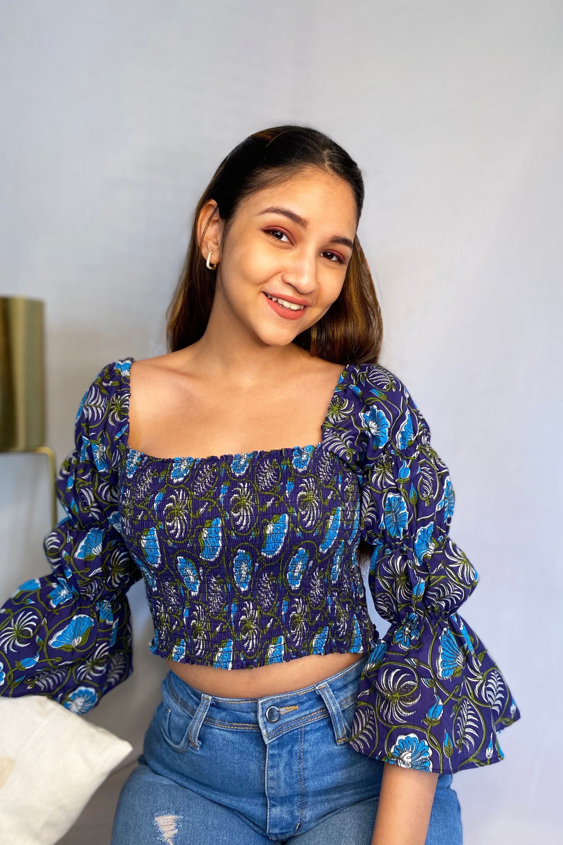 Smocked top from in a Blue Floral Print Crafted from Cotton