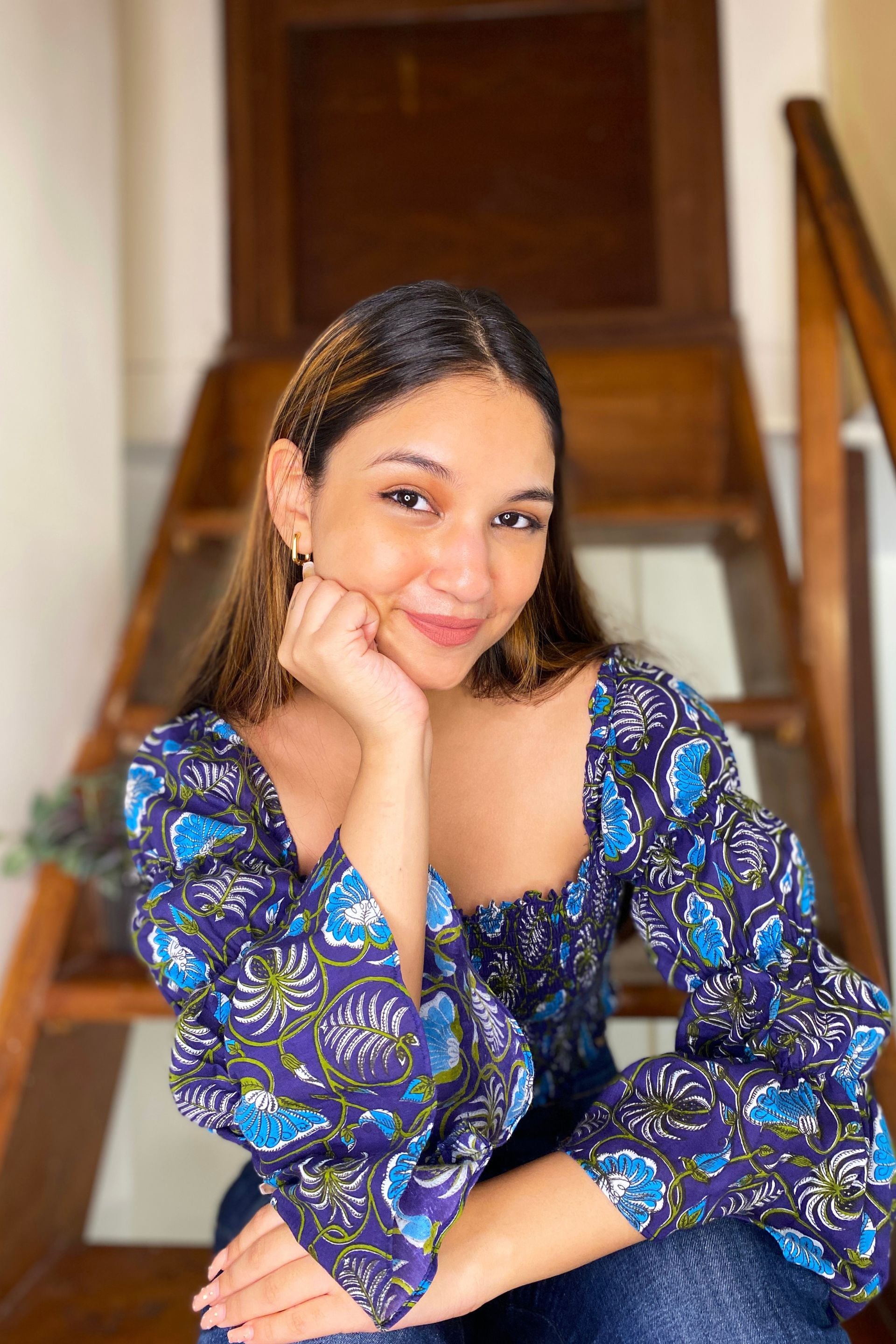 Smocked top from in a Blue Floral Print Crafted from Cotton
