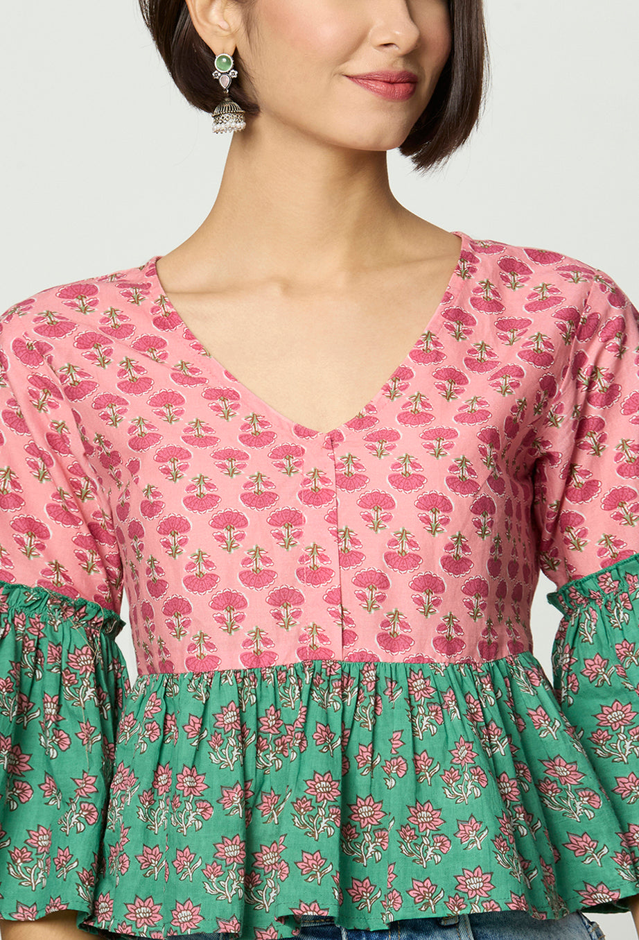 Pink and Green Floral printed Peplum Top