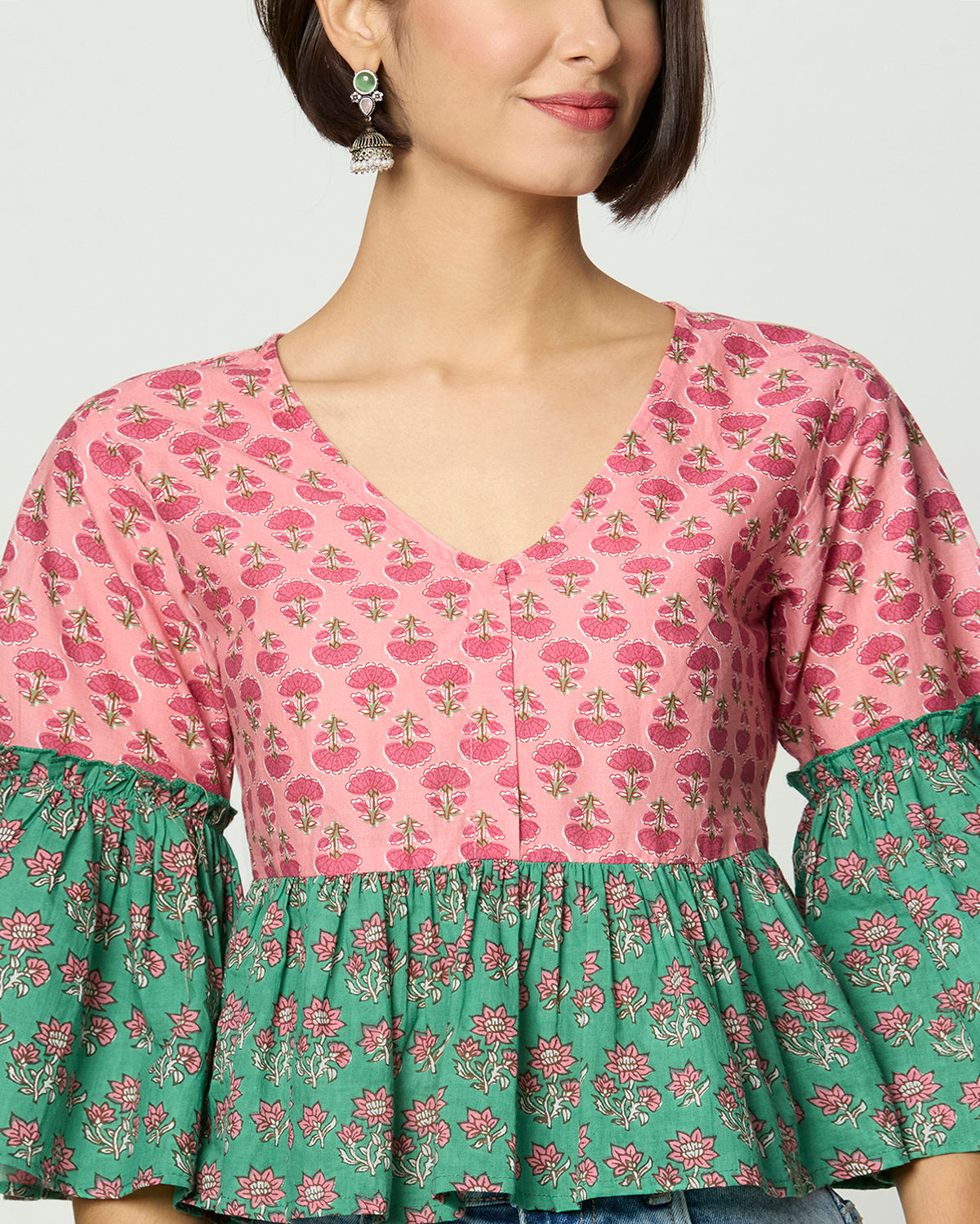 Pink and Green Floral printed Peplum Top